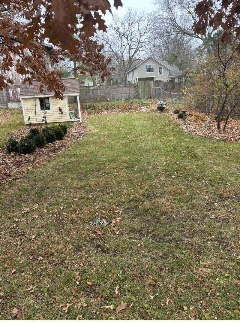 Clean yard after fall leaf removal service by Ryan Ras in Eastern Iowa