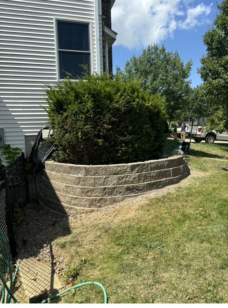 Curved retaining wall by Ryan Ras in Eastern Iowa